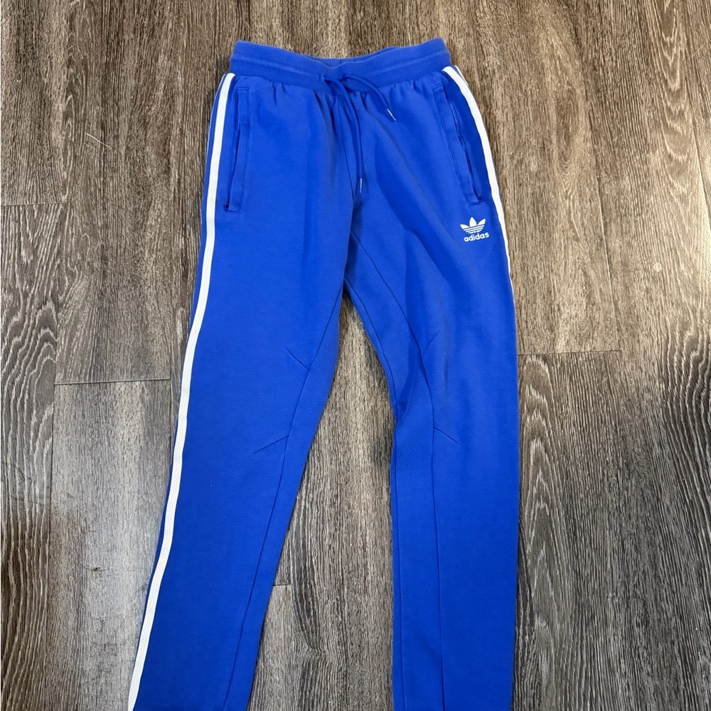 Adidas pharel williams Men's Royal Blue Joggers with White Accents